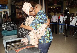 Serafina Mukantabana (left) receives a  warm welcome from a  relative upon her arrival at Kigali International Airport, from Zambia, last year. The New Times / File