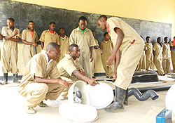 TVET Ngarama graduates demonstrate their plumbing skills. 