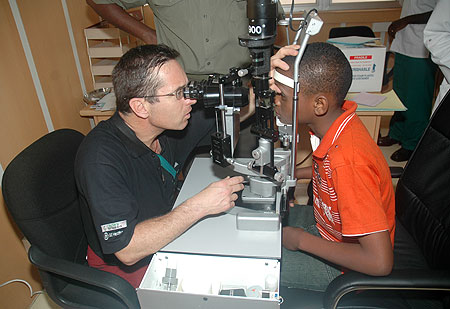 A doctor screens an eye patient before an operation.The New Times / File