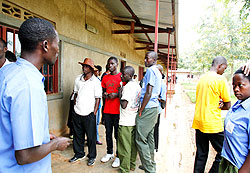 Some of the students who were stranded at the now-closed school yesterday. The New Times / Timothy Kisambira.