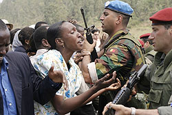 A scene in a Genocide movie about the abandonment of refugees by Belgian UN peacekeepers. A Belgian lawyer has sued his country's army of  leaving Tutsis at the mercy of the Interahamwe militia.