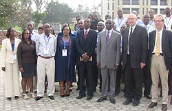 Rugege (3rd R) with ILPD staff members and  new students in  a group photo on Tuesday. The New Times / File