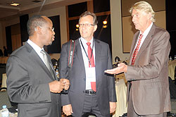 RDB CEO,  John Gara (L) chats with Morten Svelle from the Norwegian Embassy (C) and the Norfund Investment Director for Eastern Africa, Per Emil Lidoe, yesterday. The New Times / J.Mbanda