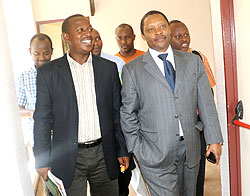Cyril Turatsinze, PS, Ministry of Local Government (L), with the CEO Rwanda Governance Board, Prof. Anastase Shyaka (R)after the meeting yesterday.The New Times / J. Mbanda.