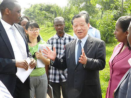 Japan's Ambassador to Rwanda, Kunio Hatanaka, speaking to Kayonza residents about setting up a roadside station in Mukarange. The New Times / S. Rwembeho. 