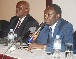 ICTR Prosecutor Boubakar Jallow (L) and Prosecutor General Martin Ngoga at the handover of Jean Uwikindi's case file earlier this week.