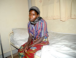 Zawadi Murekatete  on a hospital bed at CHUK.