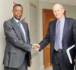 Defence Minister Gen. James Kabarebe (L) and US Senior Adviser on Darfur, Ambassador Dane Smith after their meeting yesterday. The New Times / John Mbanda.