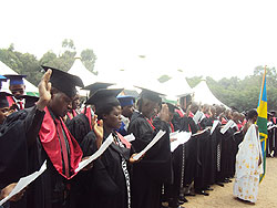 Medical students take the Hoppocratic Oath during the graduation ceremony last Friday. The New Times  / J.P. Bucyensenge