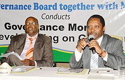 The head  of Rwanda Governance Board, Prof. Anastase Shyaka (R) with Local Government Minister James Musoni. 