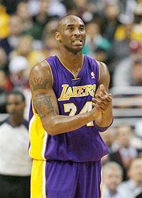 Los Angeles Lakers' Kobe Bryant (24) reacts after he missed a shot against the Philadelphia 76ers in the first half. Net photo.