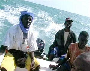 Pirates on a speed boat near the enclave of Eyl, Somalia in this framegrab made from a November 24, 2008 TV footage. Net  Photo.
