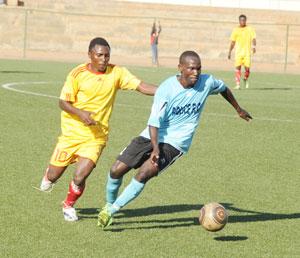  Laudit Mavugo (R) takes on an Etincelles defender in a past league encounter. He scored a brace on Wednesday. The New Times / File