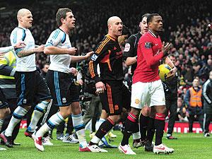 Tensions ran high as Patrice Evra's Manchester United celebrated their 2-1 win over Liverpool wildly, much to the annoyance of the Liverpool players. Net photo