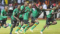 AFRICAN KINGS: Zambian players celebrate after the winning penalty last night. Net Photo.