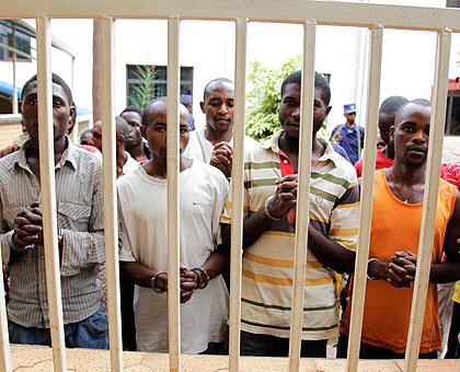Some of the drug traffickers who were arrested during last weekend's police  swoop . The New Times / T. Kisambira