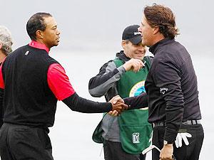Mickelson outscored Woods (75) by a full 11 shots as Tiger fell back into a tie for 15th. Net photo