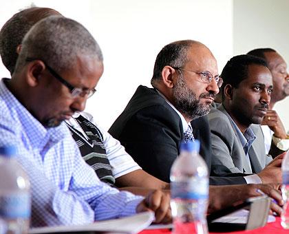 Experts from various countries listen to a presentation during the meeting. The New Times / T. Kisambira
