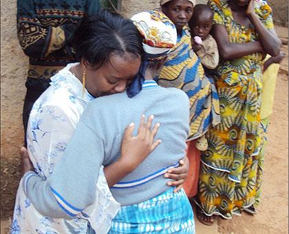 Gerardine Mukakabego (L), a Rwandan refugee living in Zambia shed tears of joy when she met her mother for the first time since 1994. The New Times JP Bucyensenge.