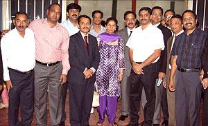 Some of the Indian Community members living in Rwanda posing with their Minister of State for External Affairs, Madam Preneet Kaur (C) after the get together party The Sunday Times / Courtsey