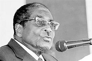 Zimbabwes President Robert Mugabe speaks during a visit to Mimosa Platinum outside Harare, February 16, 2012.