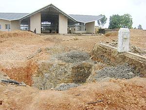 The old graveyard of  Genocide victims in Cyanika with the new memorial site built in the background. Over 25,000 remains will be accorded a decent burial.