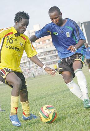 APR and Uganda Cranes midfielder Dan Wagaluka (L) in action during last year's Cecafa Senior Challenge Cup. (Net Photo)