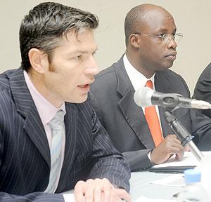 Pierre Souverain from Pfizer (L) with acting Director General of RBC Claver Kayumba. Pfizer, an International Pharmaceutical company, held a three-day workshop to discuss strategies of how counterfeit drugs can be combated. The New Times/ J. Mbanda