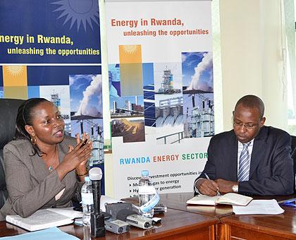 State Minister Emma Francoise Isumbingabo and Deputy Director General of EWSA Yusuf Uwamahoro at the news conference yesterday. The New Times / Courtesy.