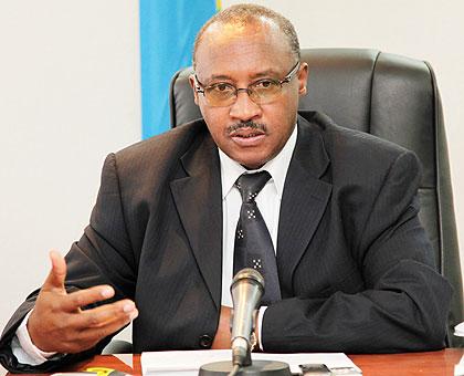 Minister Protais Musoni addressing journalists yesterday.