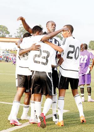 APR players celebrate after scoring against La Jeunesse in the Primus National League. The army side knocked out Kenyau2019s Tusker FC yesterday to reach the first round of the CAF Orange Champions League. The New Times/File.