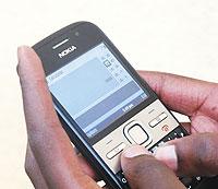 Mobile penetration rate continues to increase compared to fixed lines. The New Times /  File.