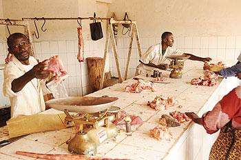 Butchery attendants. RBS wants to reduce contamination of meat. The New Times / File.