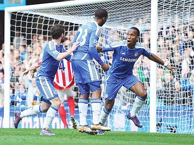 Didier Drogba celebrates after notching his 100th Premier League goal against Wolves on Saturday. 