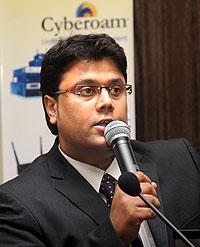 Manish Karanji, a manager with Cyberoam making a presentation. The New Times / J.Mbanda