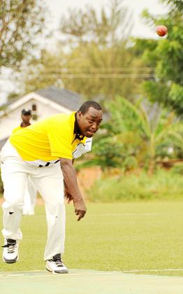 Rwanda Cricket Association's Emmanuel Byiringiro is happy with the new equipment donated by Cricket without Boundaries.The New Times / File.