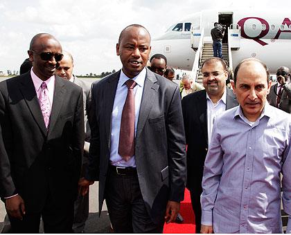 (L-R) Richard Masozera of Rwanda Cival Aviation Authority, Minister Albert Nsengiyumva of Infrastructure and Akbar Al Baker CEO of Qatar Airways Infrastructure during the arrival of Qatar Airways.  The New Times / Timothy Kisambira.