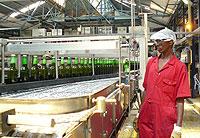 A staff at Bralirwa beverage plant. The secondary sector contributed 2.4 percentage points to the GDP growth last year. The New Times / File.