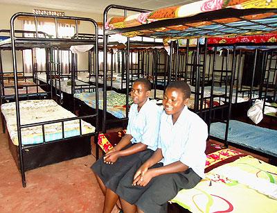 Sigh of relief, girls were all smiles as they relocated to new dormitories. The Sunday Times / S. Rwembeho.