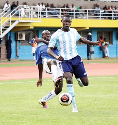 Police's Laudit Mavugo (with the ball) has been in top form for the club. He scored the opener yesterday against SC Kiyovu.  The New Times / T. Kisambira.