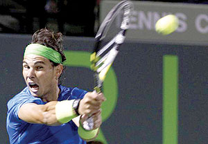 THROUGH: Rafael Nadal. Net photo.