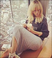Another level: Rihanna poses in her hotel room in Tokyo where she is currently staying ahead of the premiere of Battleship in Japan. Net photo