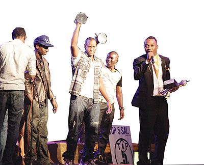 King James (R) celebrates after winning three awards in different categories. 