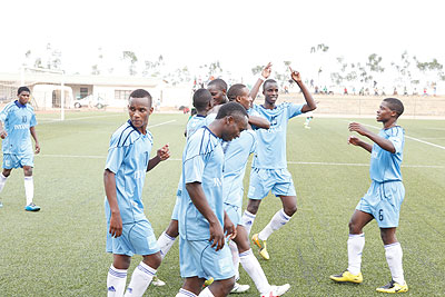 Isonga players celebrate after scoring against SC Kiyovu in a past league match. Head coach believes his team is ready to challenge for trophies. The New Times/File.