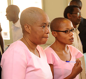Agnes Nkusi Uwimana (R) and Saidath Mukakibibi in court.  The New Times / file.