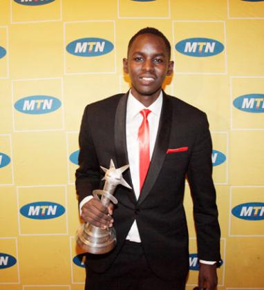 Khizz poses with his award after winning the u201cNew Artist 2011u201d award. File photo.