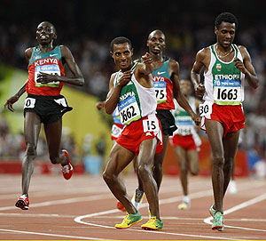 Kenenisa Bekele celebrates winning the men's 10,000m final at the Beijing Olympics. Net photo.