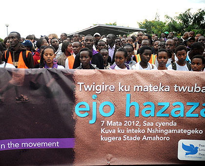 The youth during Saturdayu2019s u2018Walk-to-Rememberu2019 in memory of Genocide victims.  The New Times / Timothy Kisambira.