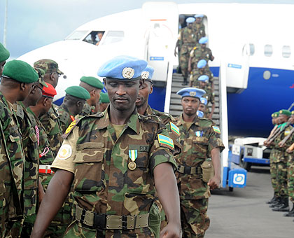 Rwandan peacekeepers upon arrival at Kigali International Airport, recently, from Darfur, where the country is involved in another UN-backed mission. The New Times / File.