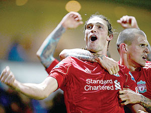 Andy Carroll was the hero for Liverpool as his late winner secured a 3-2 victory over Blackburn in the Barclays Premier League. Net photo.